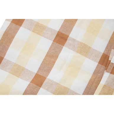 A soft beige and cream plaid fabric with subtle texture for the thread and loom terracotta gingham tablecloth