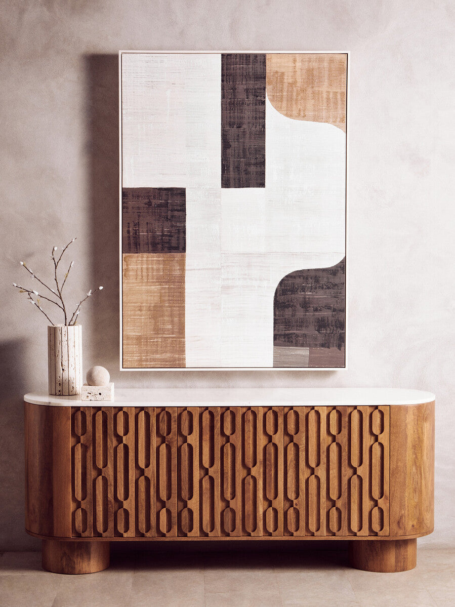 A tibor travertine ribbed vase with a modern abstract painting featuring white dark brown and light wood geometric shapes