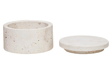 Cream-colored speckled tibor travertine round trinket box with matching lid made of travertine stone