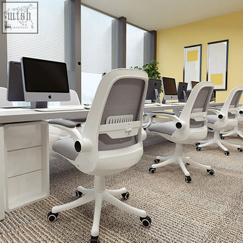 White ticova office chair with gray mesh back and seat painted steel frame and adjustable armrests on five-wheel base