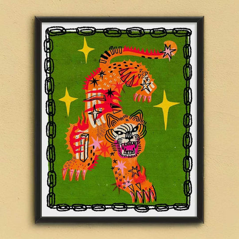 A vibrant orange tiger charm print with red and black accents surrounded by yellow stars in a sleek black frame