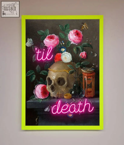 Framed til death skull wall art with gold band skull, pink and white roses, butterflies, and neon til death signs on dark background
