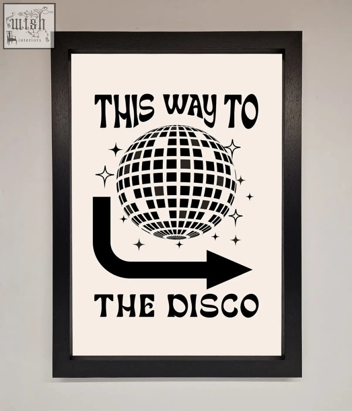 Black-framed disco framed poster with stylized disco ball and this way to the disco text on off-white background