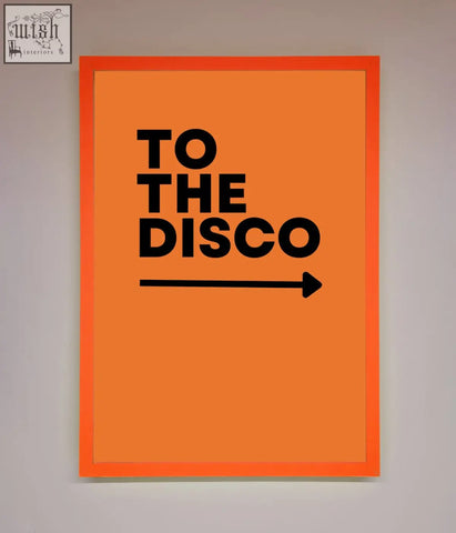 Vibrant orange disco framed print with bold black text to the disco and a directional arrow in a sleek frame