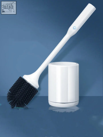White plastic toilet brush with black rubber head and matching holder for wall hanging bathroom cleaning