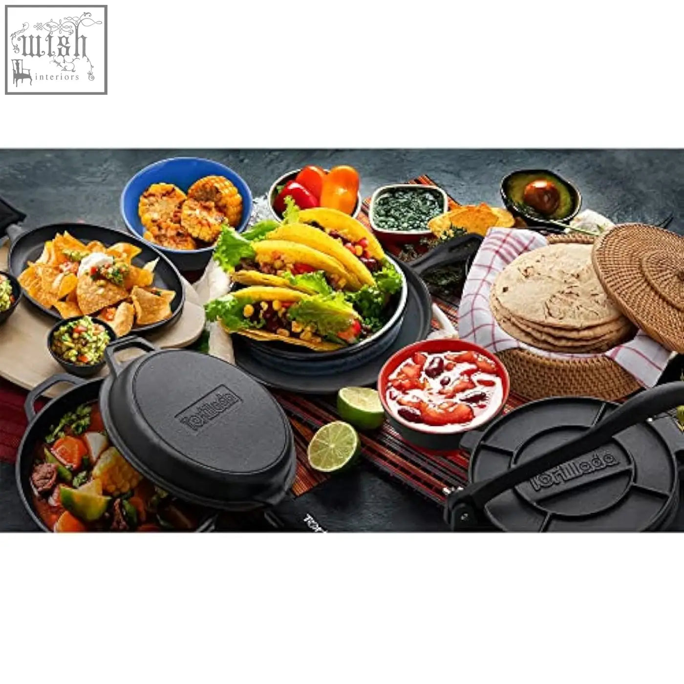 Black cast iron tortilla press with textured surface and embossed logo paired with a handmade rattan tortilla warmer basket