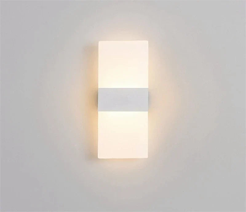 Modern white acrylic usb rechargeable touch sensor wall sconce with sleek design and cool white ambient lighting