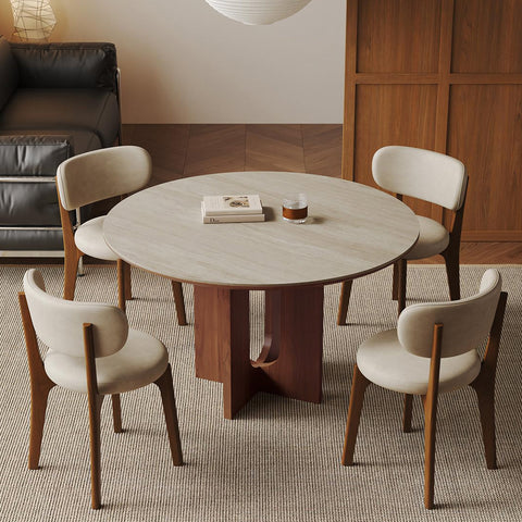 Toure round dining table with light gray marble top and dark wood base in an elegant modern design