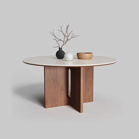 Modern toure round dining table with white laminate top and sleek walnut legs featuring an integrated handle