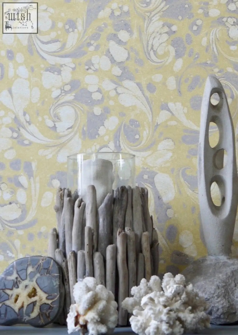 A rustic driftwood candle holder with clear glass cylinder on grayish-brown sticks perfect for tourmaline wallpaper decor check shipping times