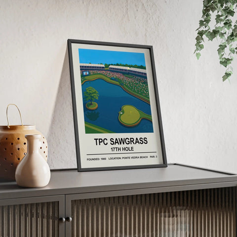 A framed tpc sawgrass 17th hole print featuring vibrant green fairways blue water hazard and spectators under clear sky