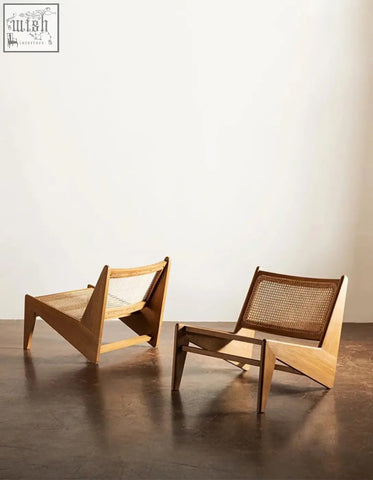 Two tracyh lounge chairs with woven rattan backs and seats in a natural light wood finish perfect for lounging