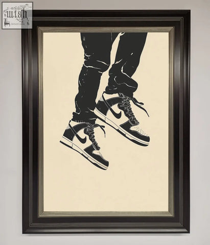 Black and white nike dunk low trainers bouncing framed wall art in dark wood frame with classic design sneakers