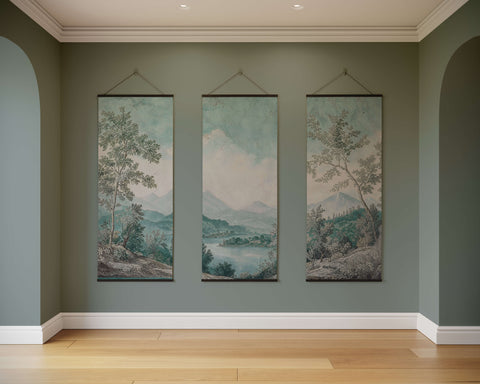 Three vertical landscape paintings with soft green and blue hues in dark wood frames for a tranquil lake tapestry