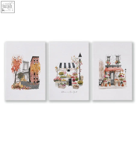 Set of three travel art prints featuring autumn manhattan cityscapes with warm tones on white canvas