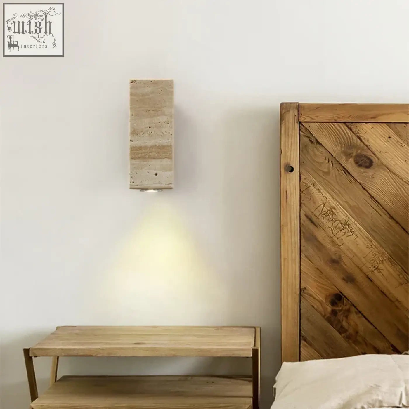 Beige travertine wall light with rectangular shape and subtle textured surface for indoor outdoor use