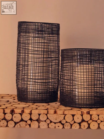 Black wire mesh trento cylindrical lantern with woven grid design perfect as a decorative cylindrical lantern