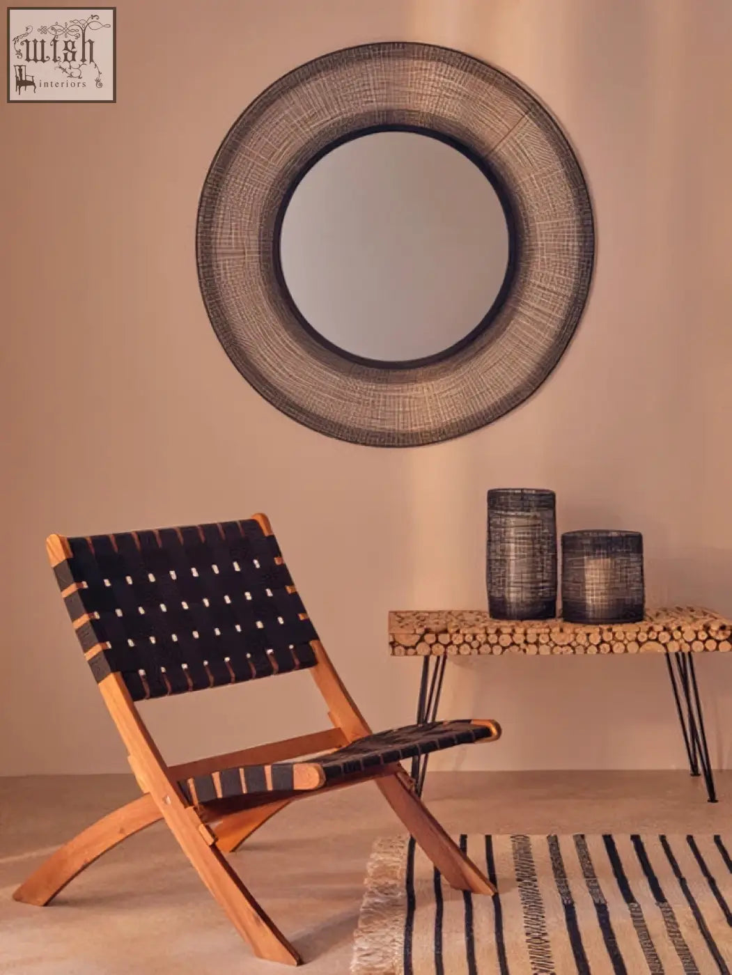 Circular woven mirror with dark textured frame featured in trento cylindrical lantern design