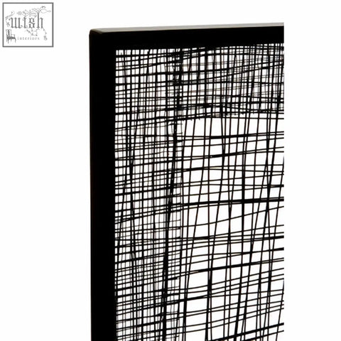 Black-framed trento metal cross wires design wall art with abstract intersecting black lines on white background