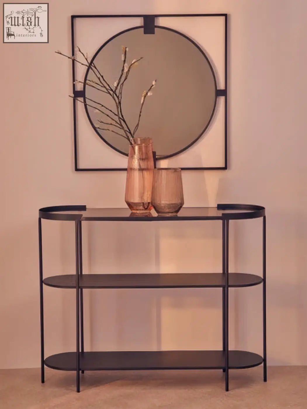 Small square black metal console table with three oval shelves and glass top in black metal frame style