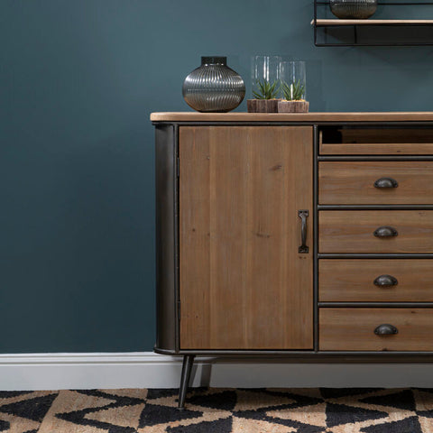 Rustic wooden drawer cabinet with dark metal frame and legs featuring one door and four drawers with vintage handles