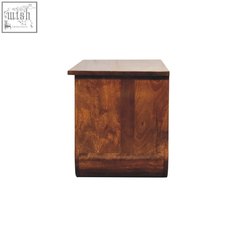 A rustic triple open style coffee table in chestnut finish made from solid mango wood with visible natural grain patterns