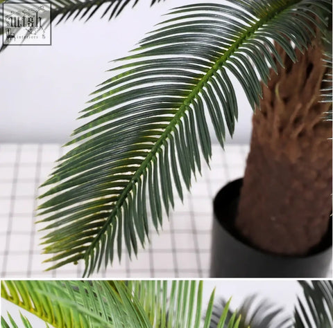 Artificial palm tree with green plastic palm leaves and textured brown trunk in black pot for tropical decor