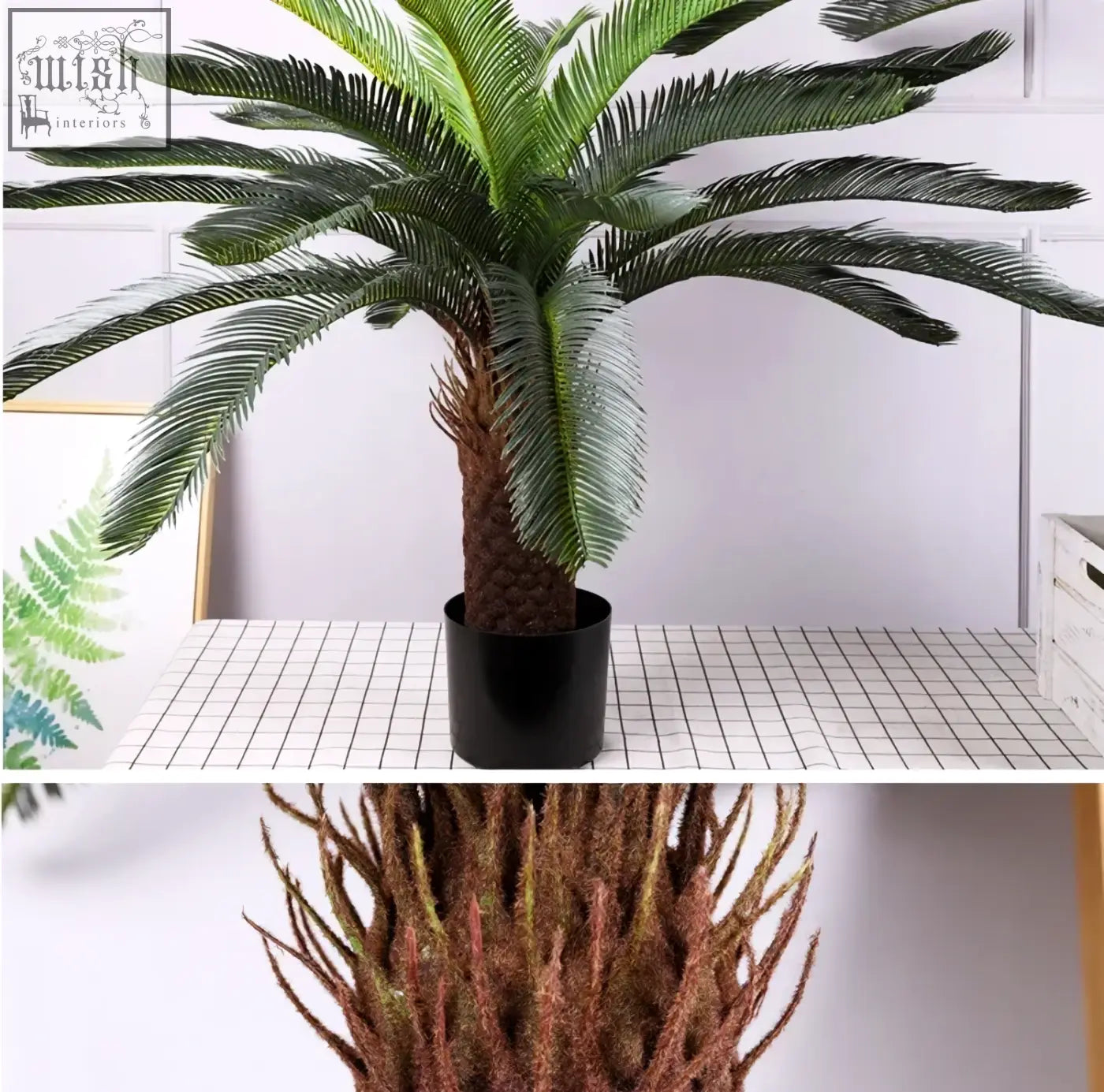 Realistic tropical artificial palm tree with lush dark green plastic palm leaves in a sleek black pot for indoor decor