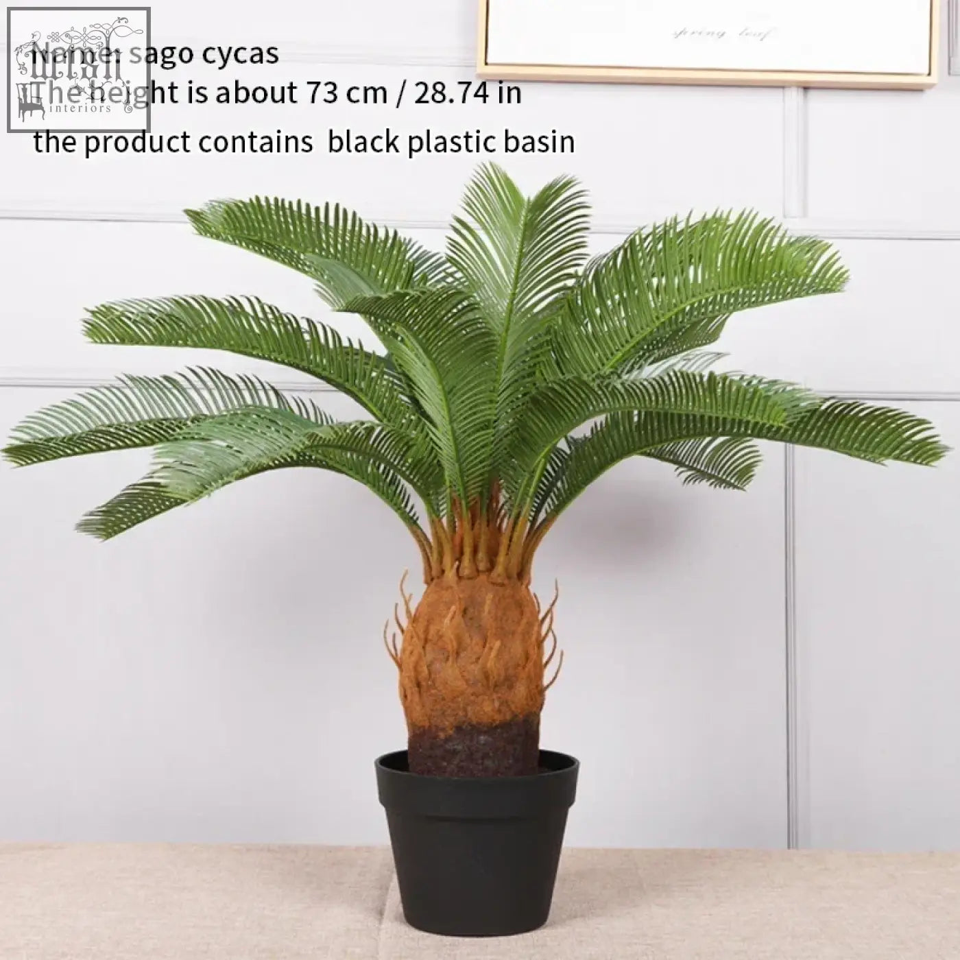 A lush tropical artificial palm tree with plastic palm leaves and a textured trunk in a black plastic basin for decor