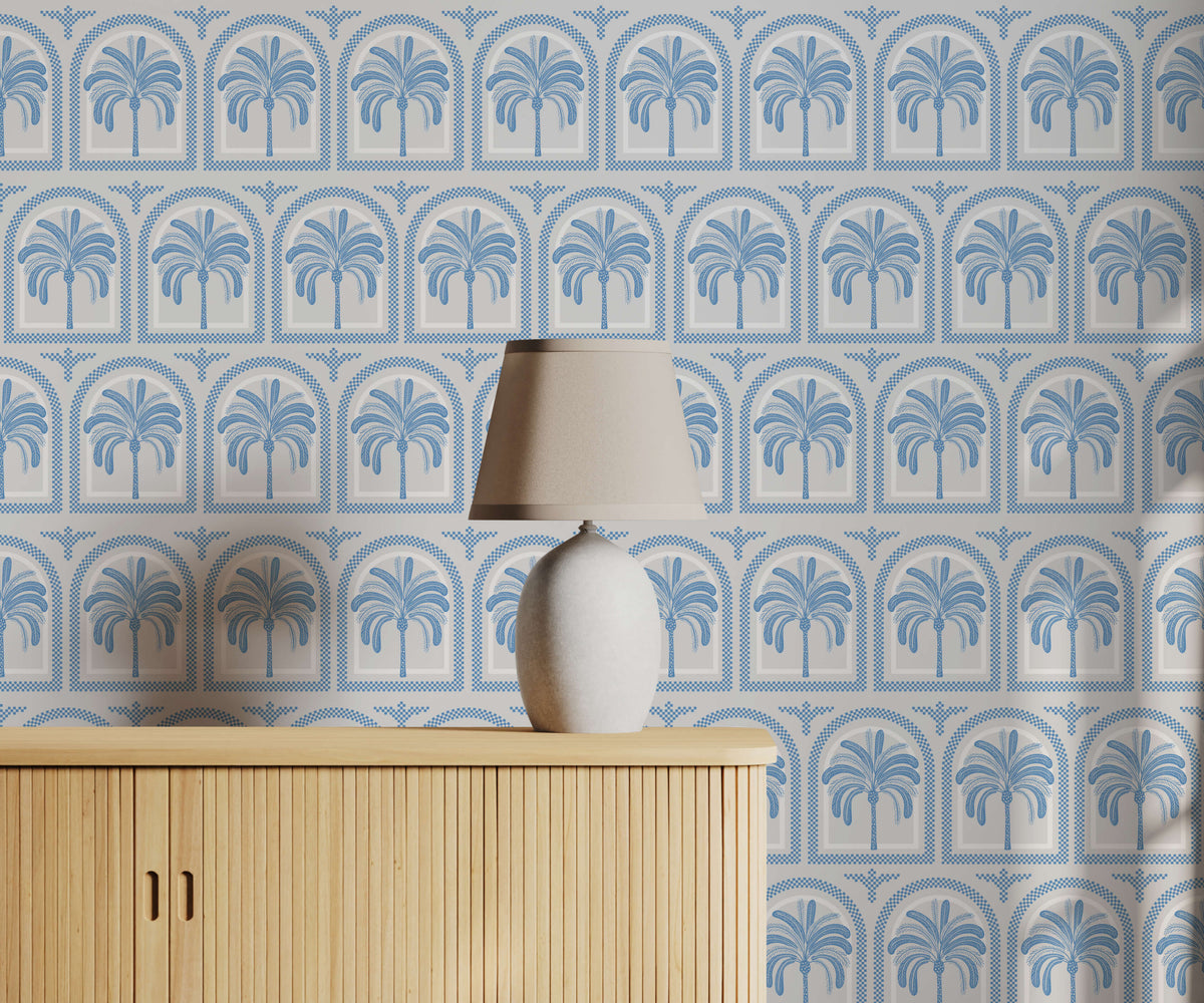 Tucci cream ceramic table lamp with a tapered rounded base and soft beige shade perfect for palm tree pattern decor
