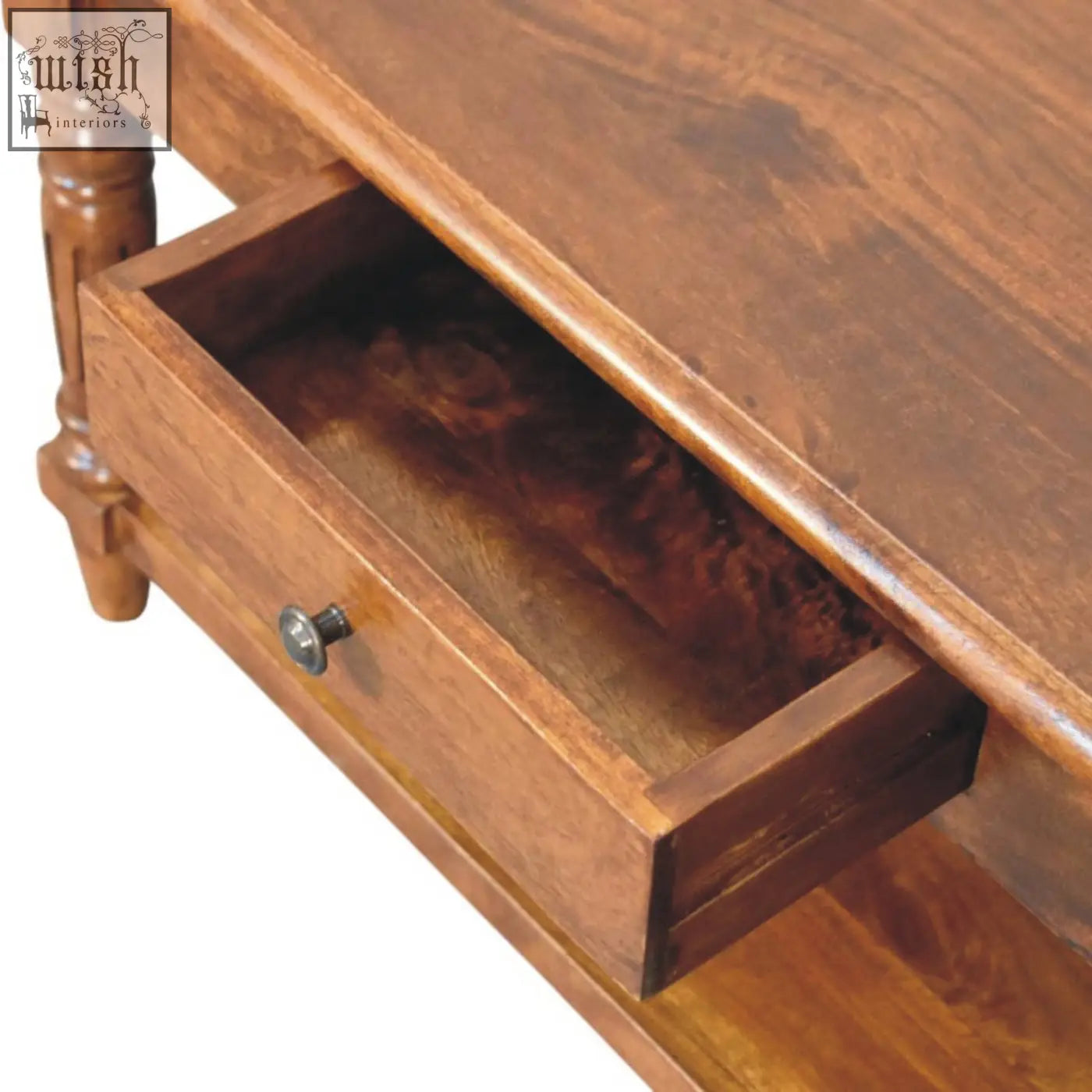 Rich brown wooden drawer with polished finish and round metal knob on turned legs living room drawer coffee table
