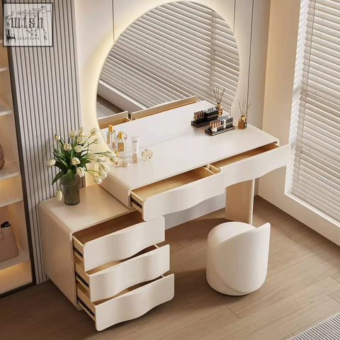 Modern cream turner dressing table with curved drawers and large round backlit LED mirror for stylish dressing