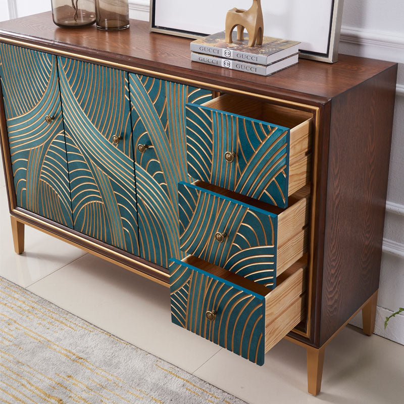 Teal and gold art deco patterned tylor sideboard with wooden drawers and legs in green finish