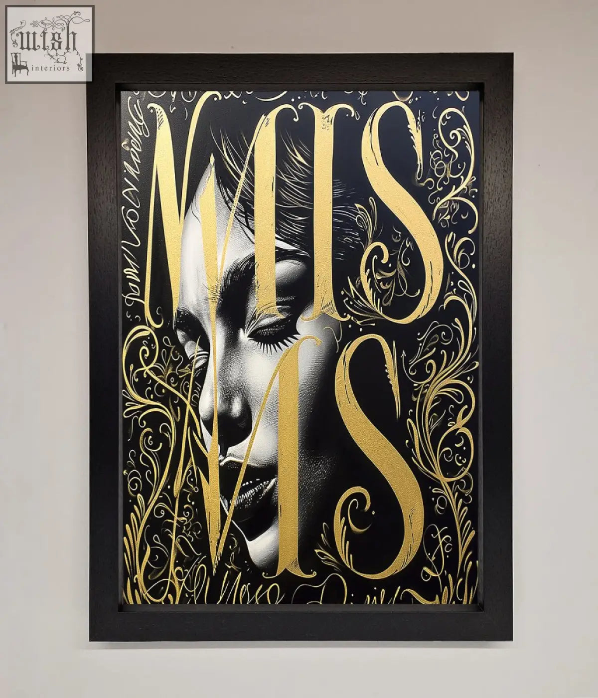 Black-framed typography queen framed poster with monochrome woman portrait gold foil lettering and ornate flourishes