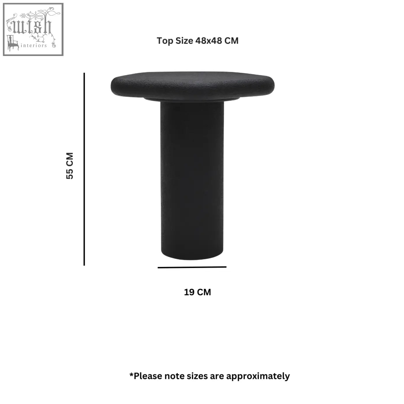 Black udaipur pentagon side table with textured finish and cushioned top in an organic shape for cozy spaces