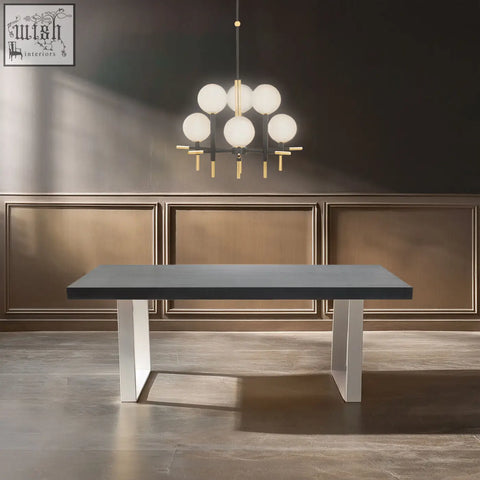 Modern ulmus dining table with a sleek dark gray concrete top and minimalist white metal legs for stylish dining