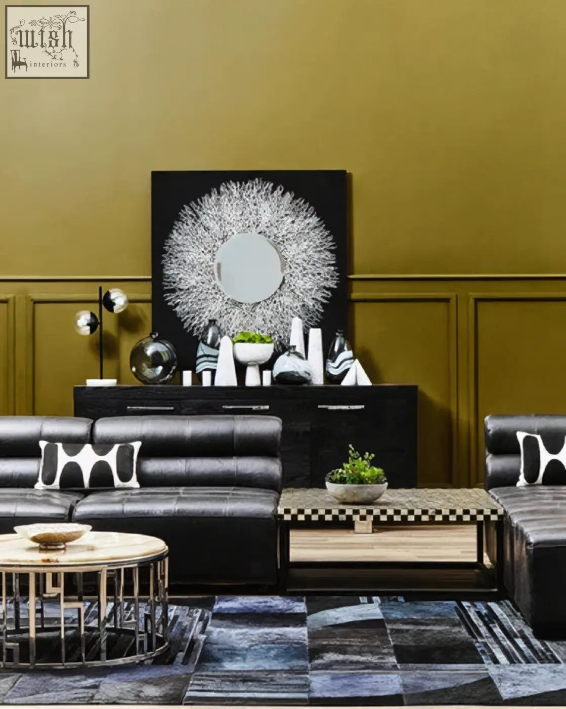 Black leather sectional sofa with white geometric pillows paired with ulmus sideboard in black elm with two cupboards