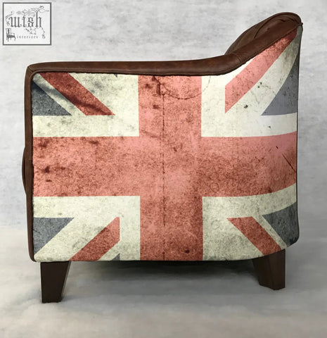 Vintage-style union tub chair upholstered in distressed union jack fabric with brown leather trim and wooden legs