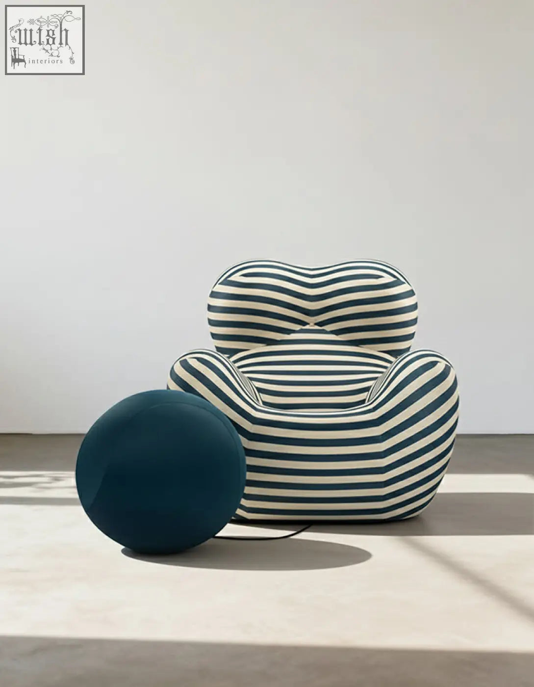 Plush cloud-shaped up50 armchair lounge chair with navy and cream bold stripes and matching ball stool