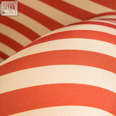 Up50 armchair lounge chair with a soft red and cream striped fabric and textured weave for cozy seating