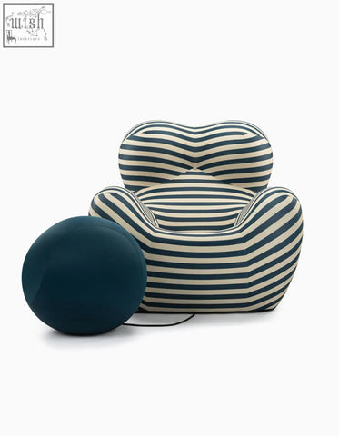 Striped navy and cream up50 armchair with a rounded plush design and matching ball stool perfect as a lounge chair