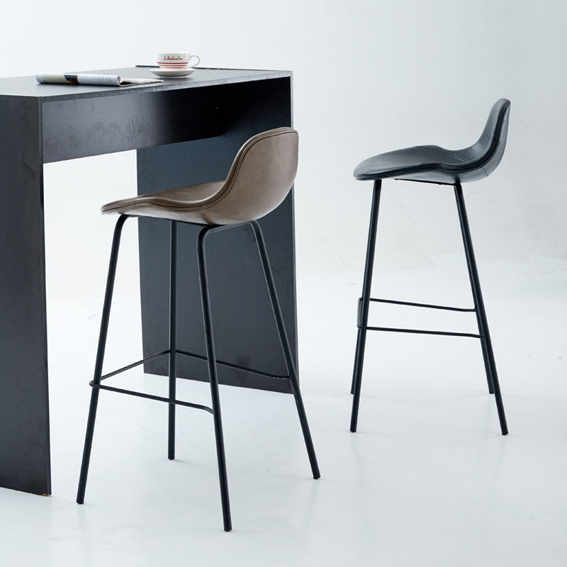 Modern black metal upton nordic bar stool with tan leather seat and backrest perfect for any nordic bar setup