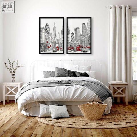 Two black-framed urban artwork wall art prints featuring london skyline with red double-decker buses in monochrome design