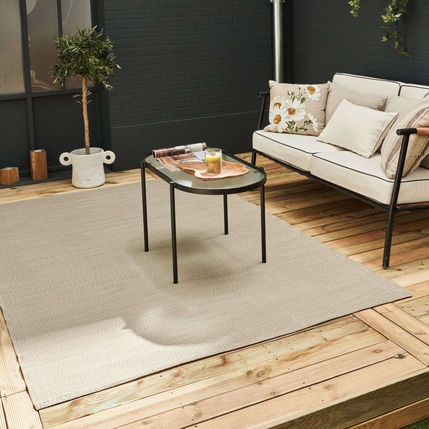Beige woven urban outdoor rug with a textured durable weave perfect for outdoor use