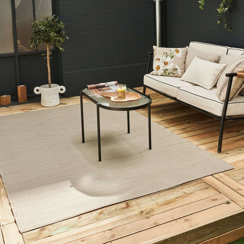Beige woven urban outdoor rug with a textured durable weave perfect for outdoor use
