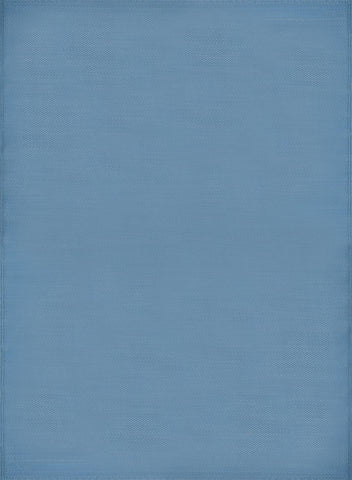 Solid light blue textured fabric surface of an urban outdoor rug perfect for outdoor rug blue settings