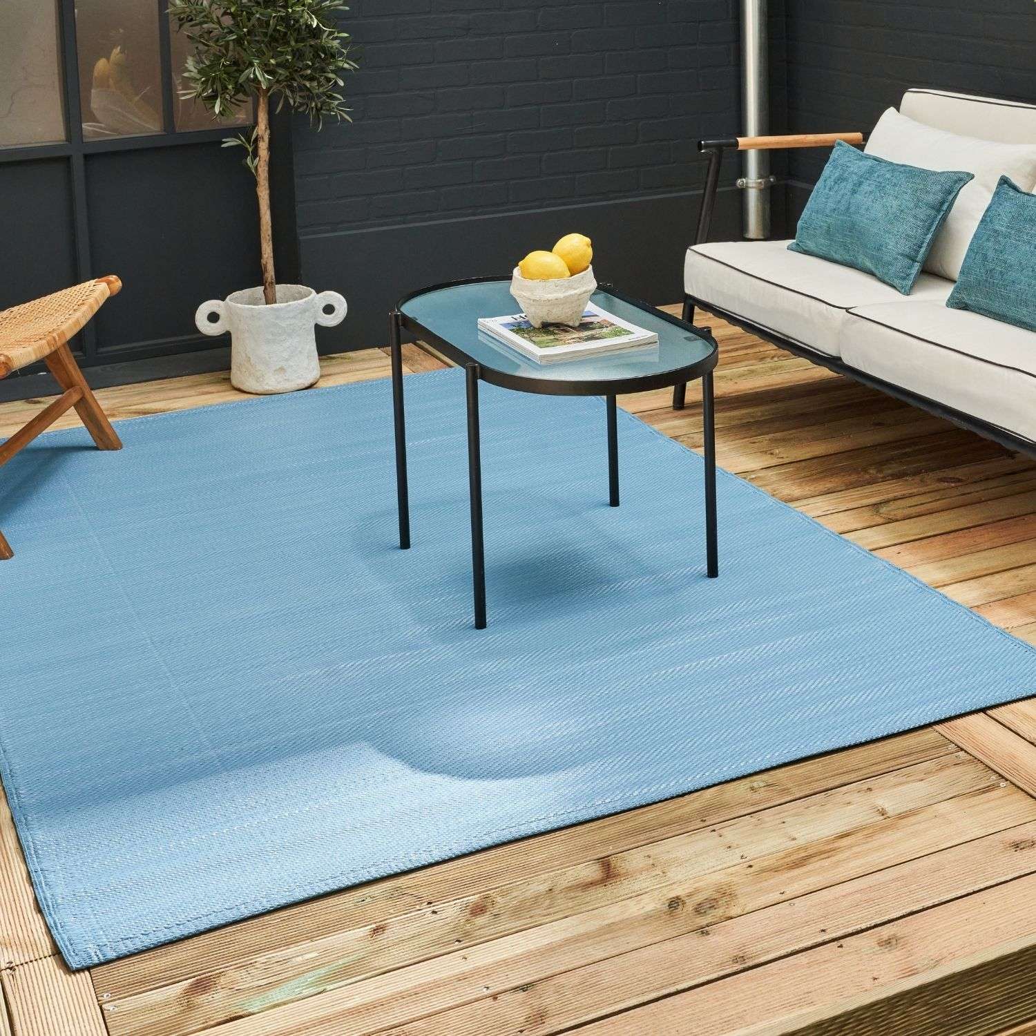 Light blue textured urban outdoor rug made from durable material perfect for stylish outdoor spaces urban outdoor rug blue
