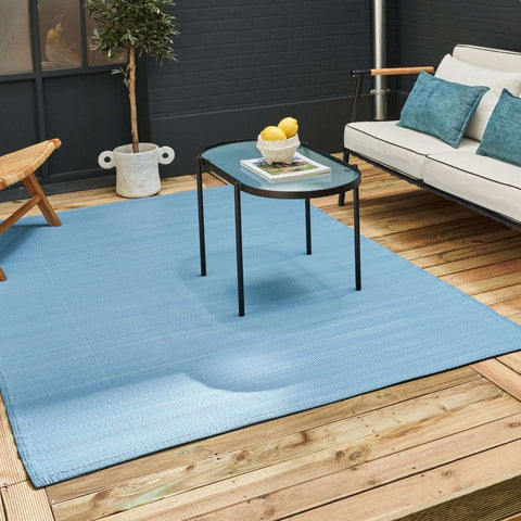 Light blue textured urban outdoor rug made from durable material perfect for stylish outdoor spaces urban outdoor rug blue