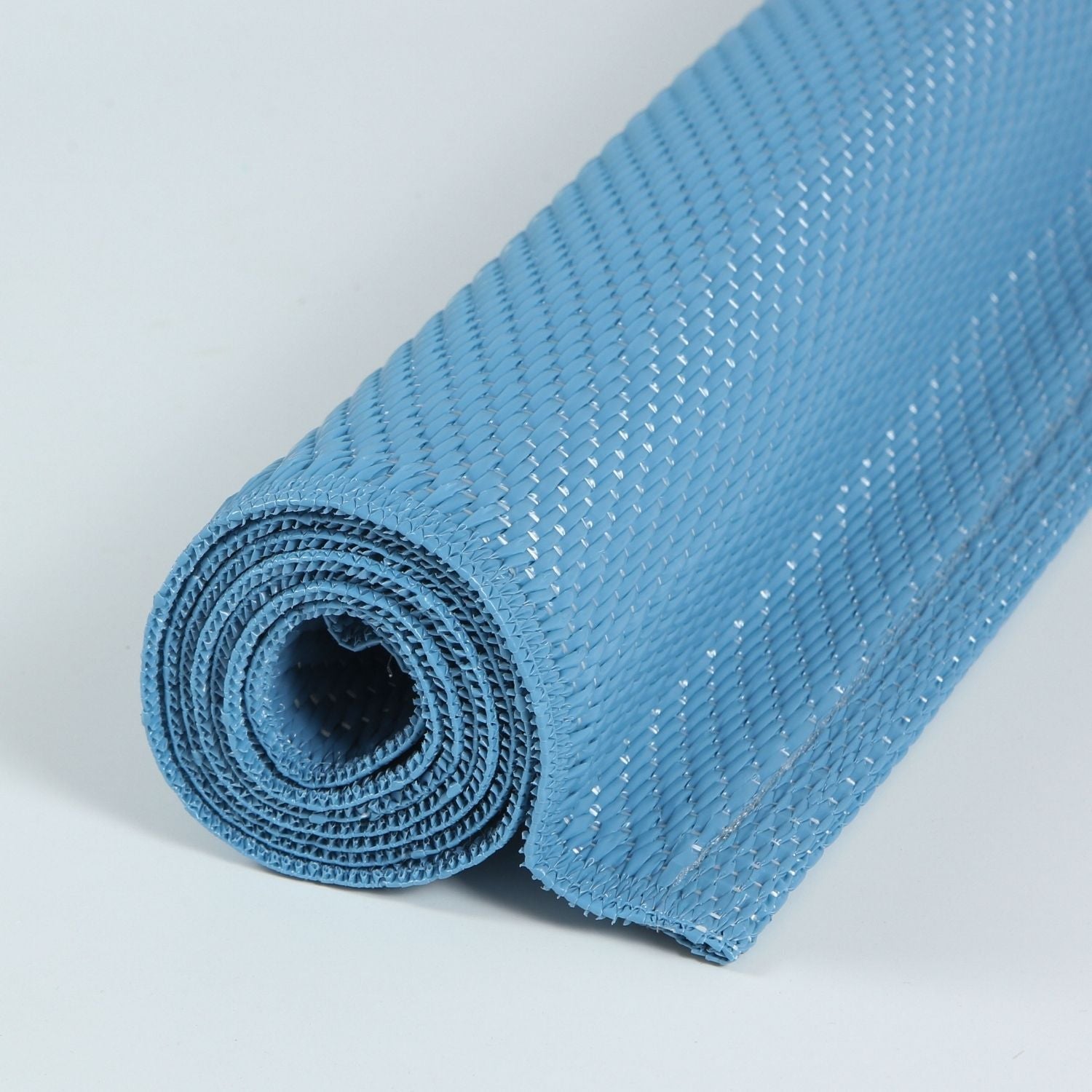 A light blue urban outdoor rug with a textured woven fabric surface and subtle reflective threads perfect for outdoor use