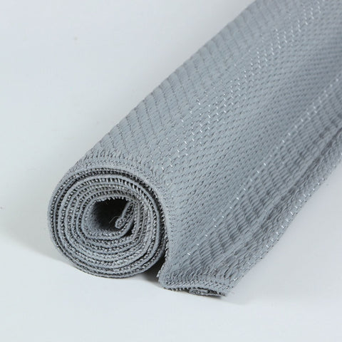 Gray woven urban outdoor rug roll with textured interlaced pattern perfect as an outdoor rug grey option
